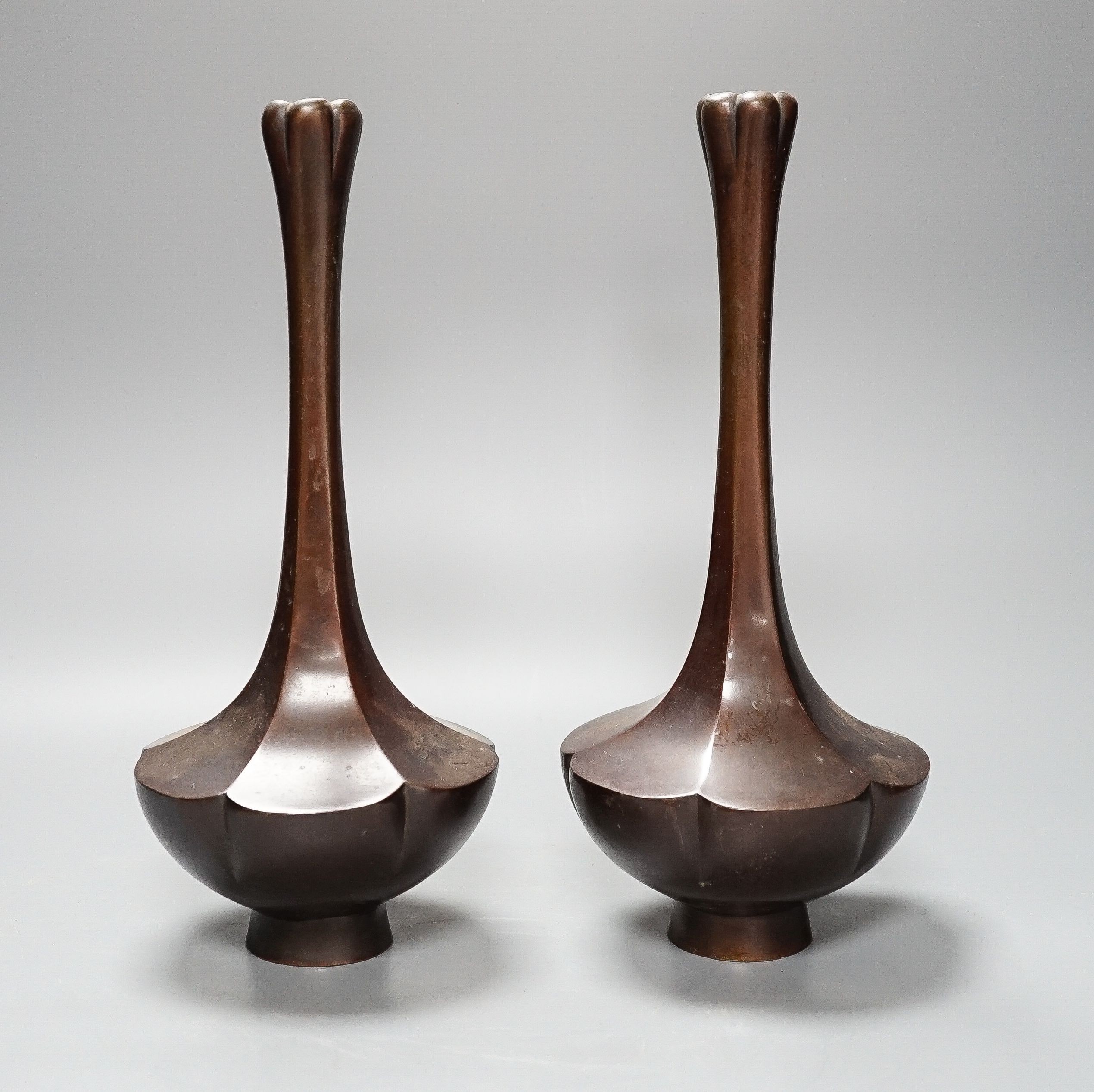 A pair of Japanese Meiji bronze bottle vases 31cm one base panel lacking